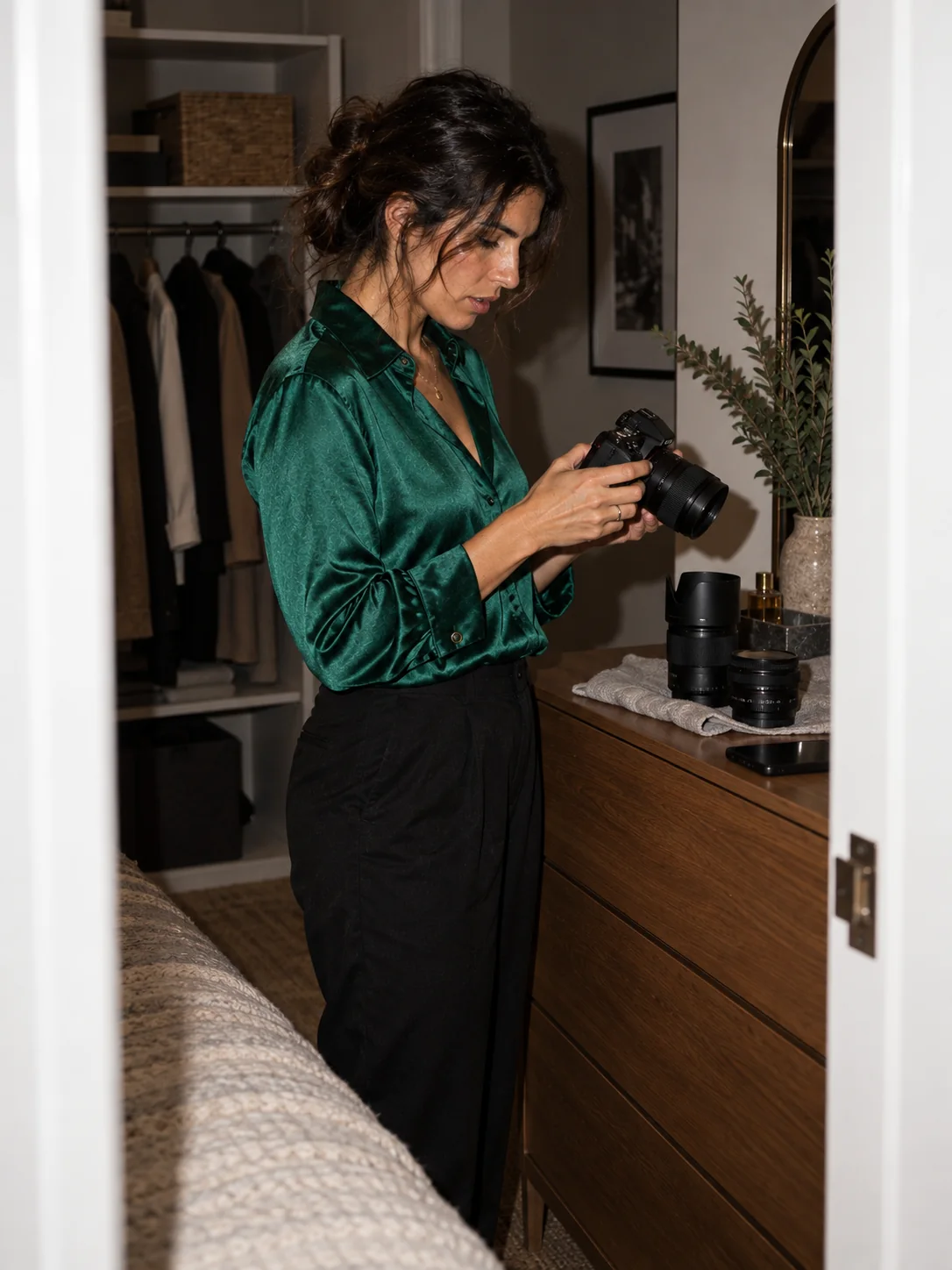 Photographer checking a camera and lens at home, with Iris answering a lens question
